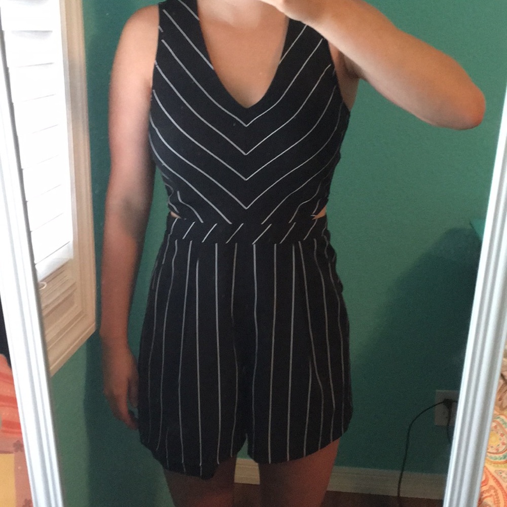 Black romper with white stripes